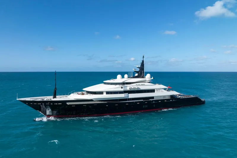 Alfa Nero Yacht Photos Pics Luxurious 2007 Oceanco 269' yacht cruising on open sea under clear blue sky.