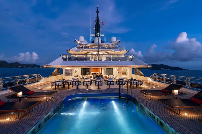 Alfa Nero Yacht Photos Pics Luxurious 2007 Oceanco 269' yacht with pool and elegant deck at sunset.