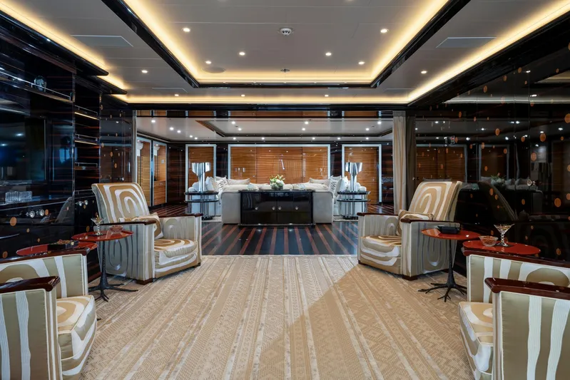 Alfa Nero Yacht Photos Pics Luxurious yacht interior with elegant seating, modern decor, and ambient lighting, Oceanco 269', 2007.