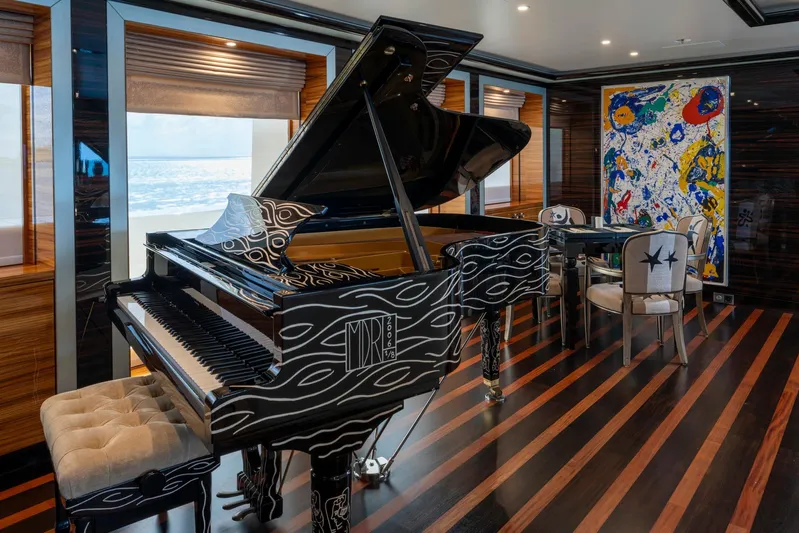 Alfa Nero Yacht Photos Pics Luxurious yacht interior with artistic grand piano and abstract painting, Oceanco 269', 2007.