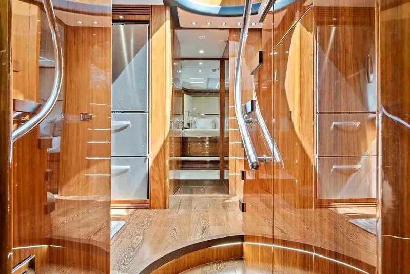  Yacht Photos Pics Luxurious interior of 2017 Sunseeker 68 Sport Yacht with polished wood finishes.