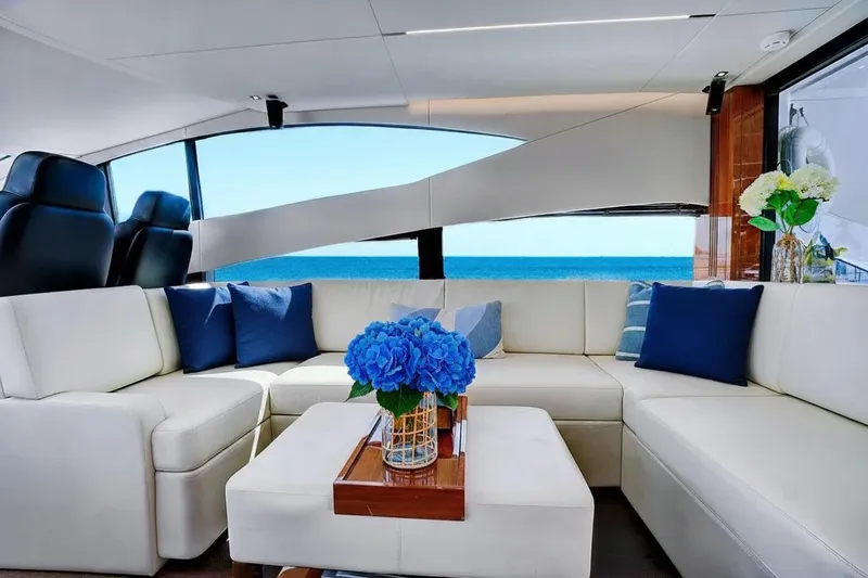  Yacht Photos Pics Luxurious interior of 2017 Sunseeker 68 Sport Yacht with ocean view and elegant seating.