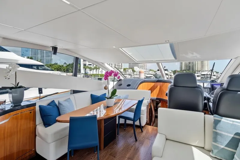  Yacht Photos Pics Luxurious interior of 2017 Sunseeker 68 Sport Yacht with elegant seating and modern decor.