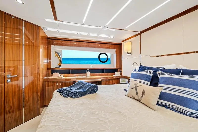  Yacht Photos Pics Luxurious 2017 Sunseeker 68 Sport Yacht bedroom with ocean view and elegant decor.