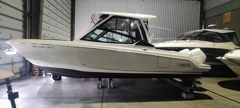  Yacht Photos Pics 2021 Boston Whaler 280 Vantage boat in a storage facility.