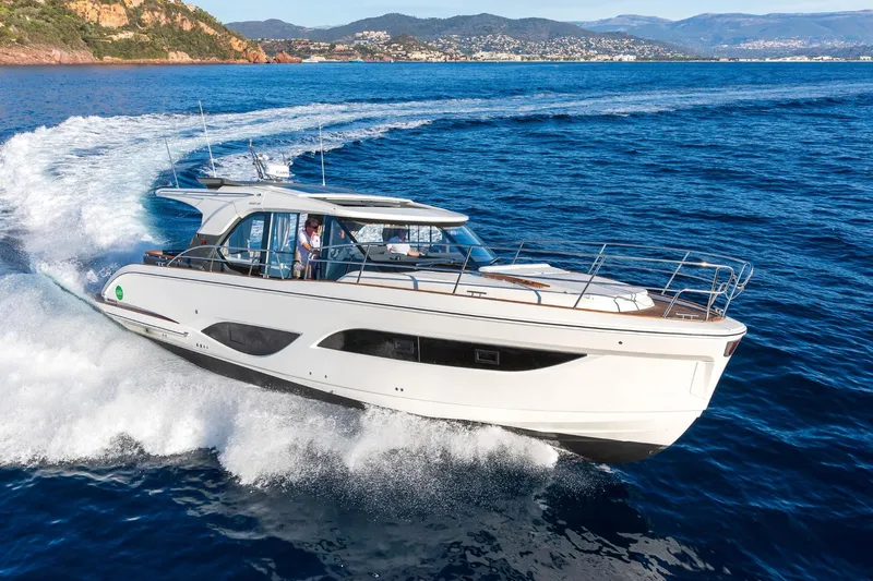  Yacht Photos Pics 2026 Marex 440 Gourmet Cruiser yacht navigating blue ocean waters.