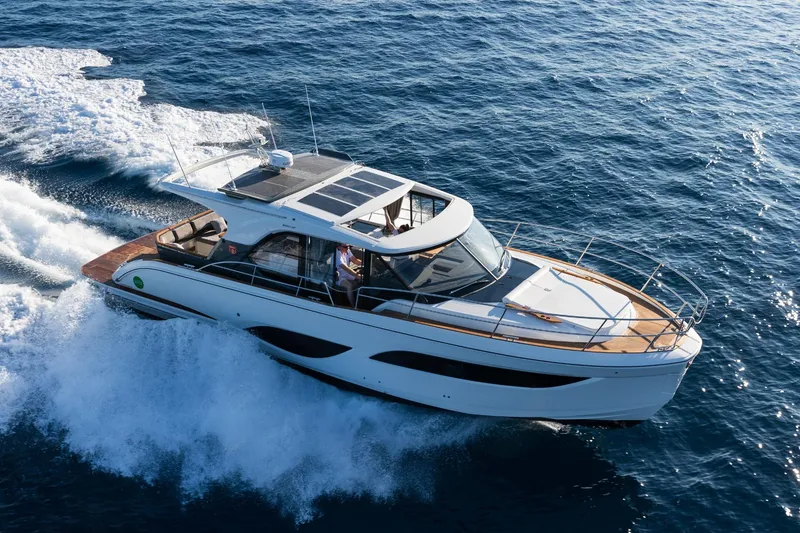  Yacht Photos Pics 2026 Marex 440 Gourmet Cruiser yacht navigating ocean waters.