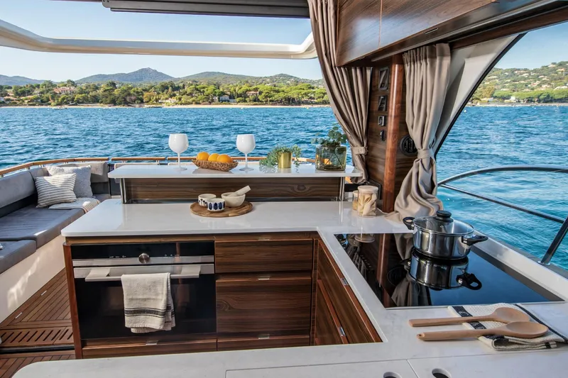  Yacht Photos Pics Luxurious kitchen on 2026 Marex 440 Gourmet Cruiser with ocean view and modern amenities.