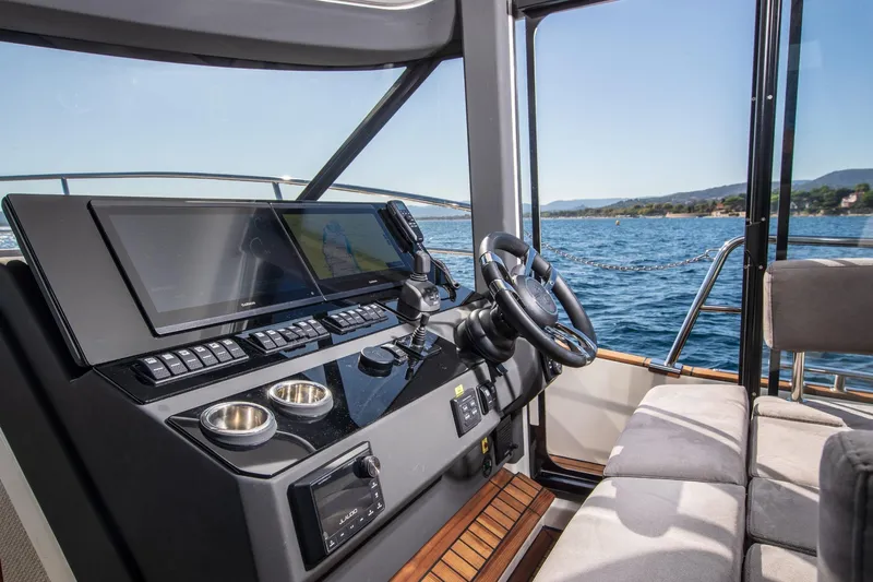  Yacht Photos Pics Interior of 2026 Marex 440 Gourmet Cruiser with modern helm and sea view.