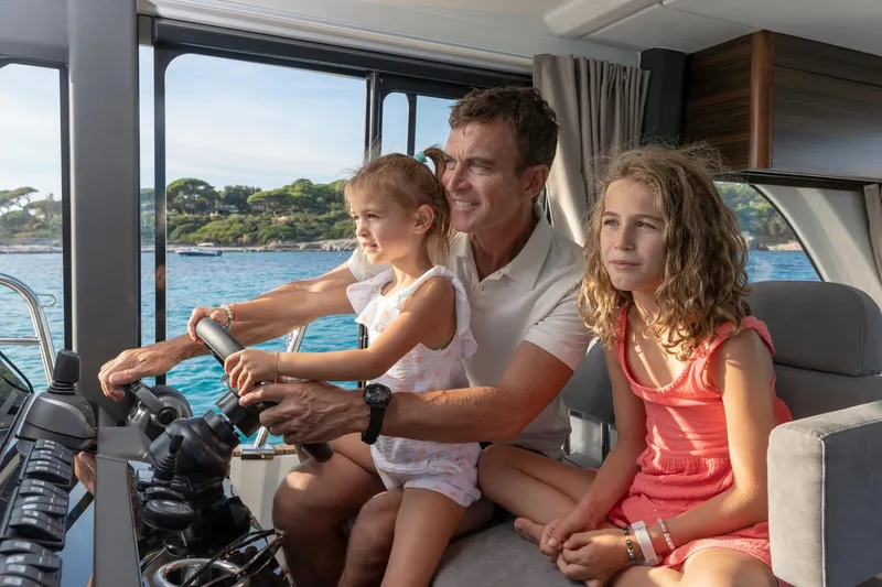  Yacht Photos Pics Family enjoying a ride on a 2026 Marex 440 Gourmet Cruiser yacht.