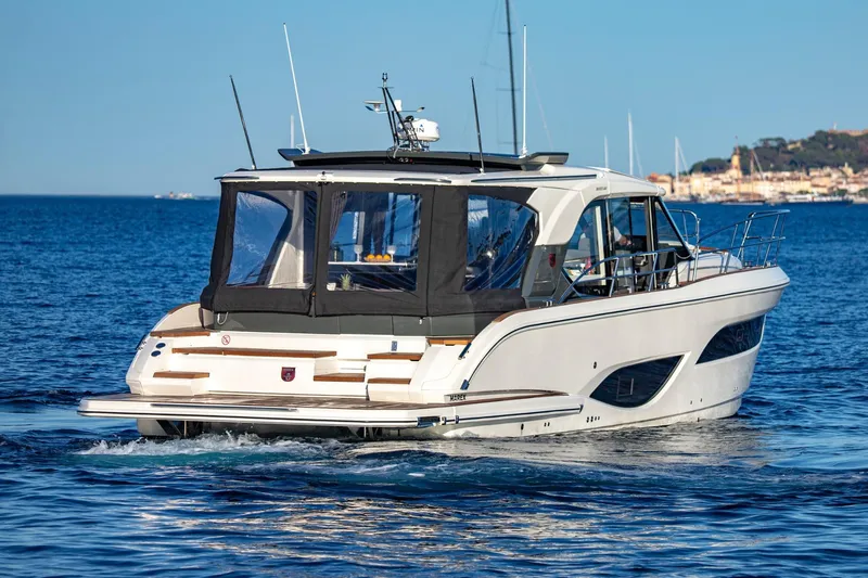  Yacht Photos Pics 2026 Marex 440 Gourmet Cruiser yacht on calm blue waters.