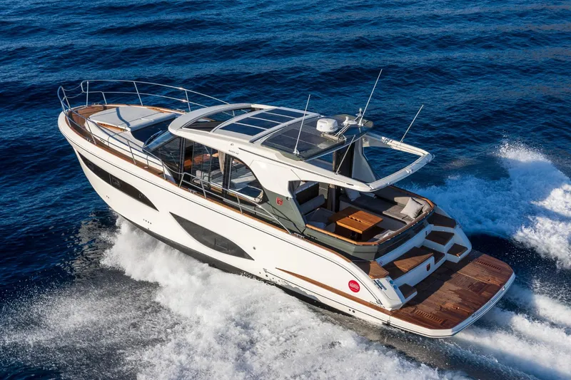  Yacht Photos Pics 2026 Marex 440 Gourmet Cruiser yacht navigating on open sea, showcasing sleek design and luxury features.
