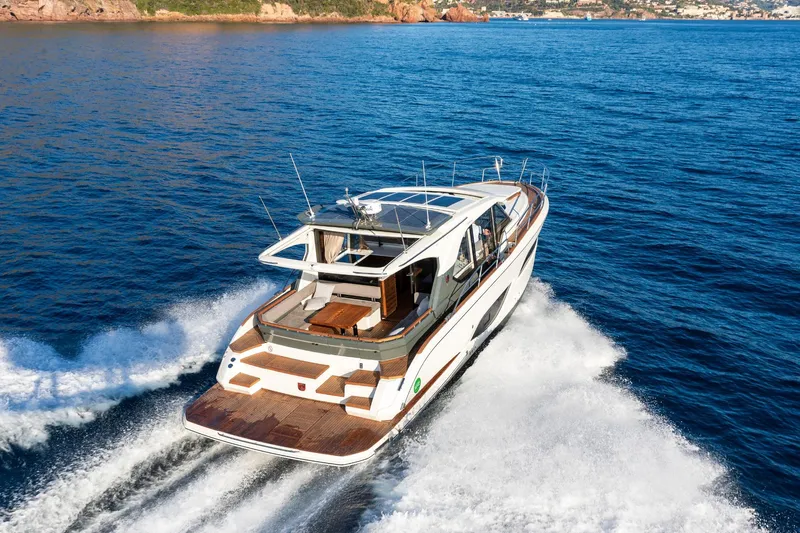  Yacht Photos Pics 2026 Marex 440 Gourmet Cruiser yacht navigating open sea, showcasing sleek design and performance.