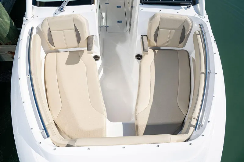 T/t Lucky Seven Yacht Photos Pics Manufacturer Provided Image: 2022 Pursuit DC 266 Dual Console boat with beige seating.