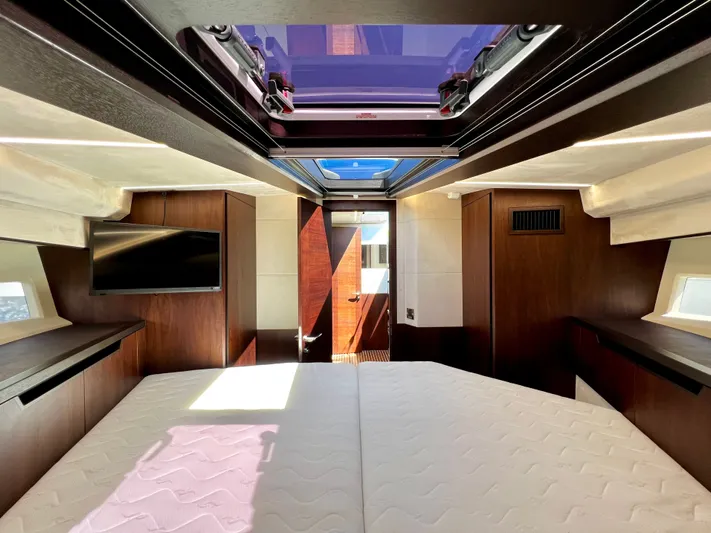  Yacht Photos Pics Interior of 2021 Galeon 425 HTS yacht with bed and skylight.