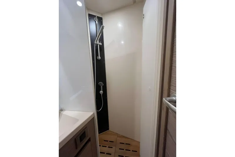 Eto Mio Yacht Photos Pics Modern shower area in 2021 Hanse 508 yacht, featuring sleek design and fixtures.