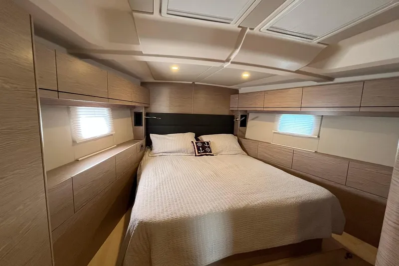 Eto Mio Yacht Photos Pics Luxurious cabin interior of 2021 Hanse 508 yacht with cozy bed and modern design.