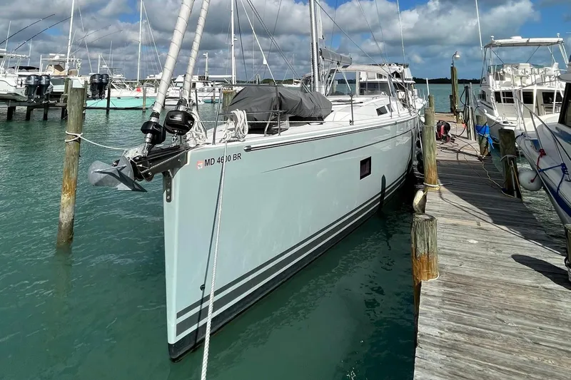 Eto Mio Yacht Photos Pics 2021 Hanse 508 yacht docked at a marina under a partly cloudy sky.
