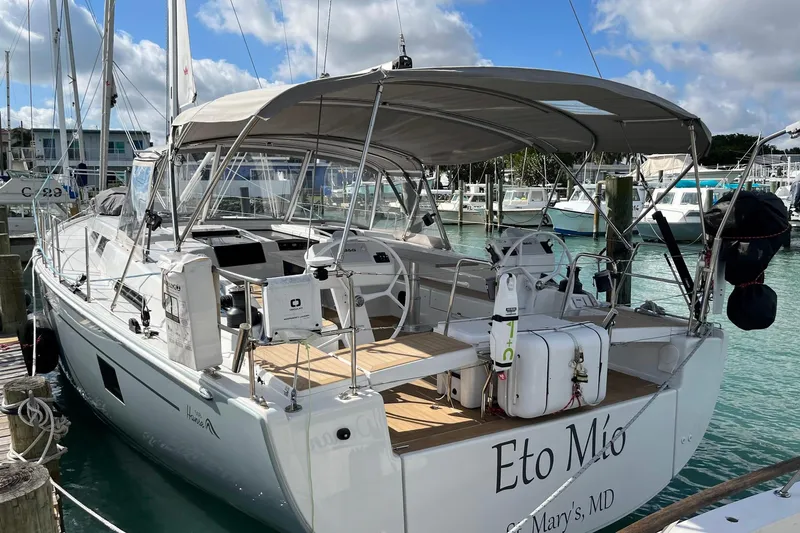 Eto Mio Yacht Photos Pics Hanse 508 yacht, 2021 model, docked in a marina with clear blue water.