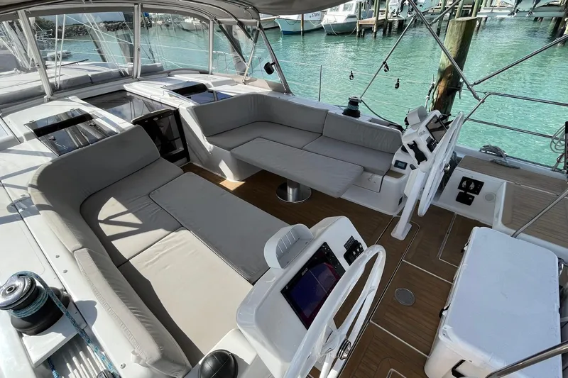 Eto Mio Yacht Photos Pics Luxurious 2021 Hanse 508 yacht cockpit with plush seating and dual steering wheels.