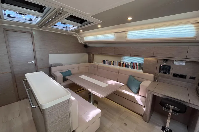 Eto Mio Yacht Photos Pics Luxurious interior of 2021 Hanse 508 yacht with modern seating and natural light.