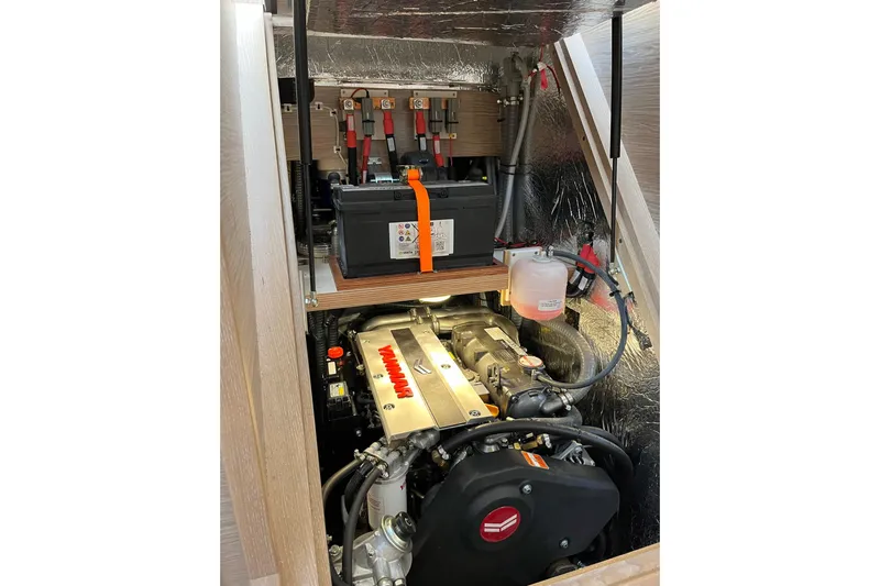 Eto Mio Yacht Photos Pics Engine compartment of a 2021 Hanse 508 yacht, featuring a Yanmar engine and battery setup.
