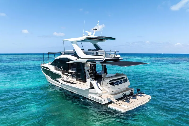 Dad Bod Yacht Photos Pics 2024 Galeon 560 Fly yacht on clear blue ocean waters.