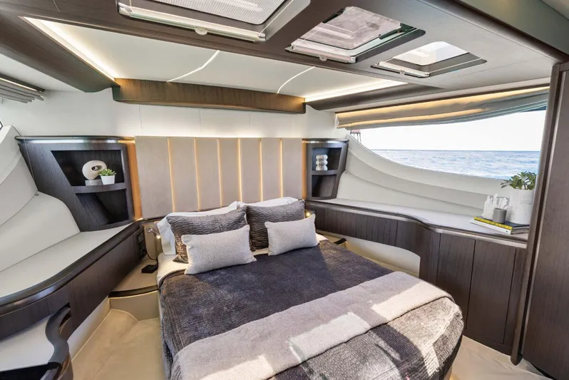 Dad Bod Yacht Photos Pics Luxurious interior of 2024 Galeon 560 Fly yacht with ocean view and modern design.