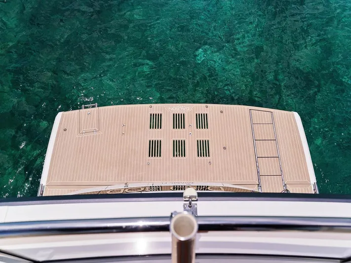 Dad Bod Yacht Photos Pics 2024 Galeon 560 Fly yacht deck above clear turquoise water.