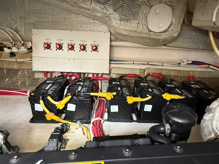  Yacht Photos Pics Engine room of 2014 Tiara Yachts 4500 Sovran with battery setup and control panel.