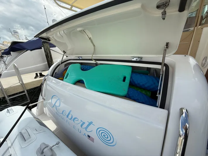  Yacht Photos Pics 2014 Tiara Yachts 4500 Sovran with open storage compartment at marina.