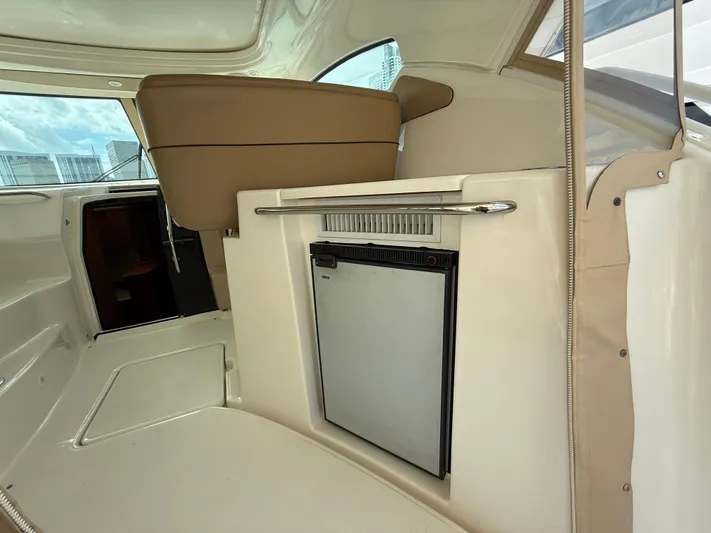  Yacht Photos Pics Interior of 2014 Tiara Yachts 4500 Sovran, featuring a compact built-in refrigerator.