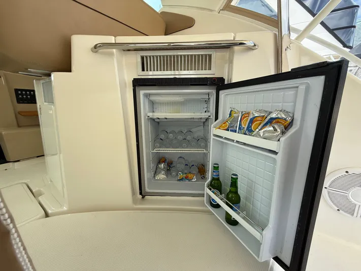  Yacht Photos Pics Mini fridge stocked with drinks on a 2014 Tiara Yachts 4500 Sovran.