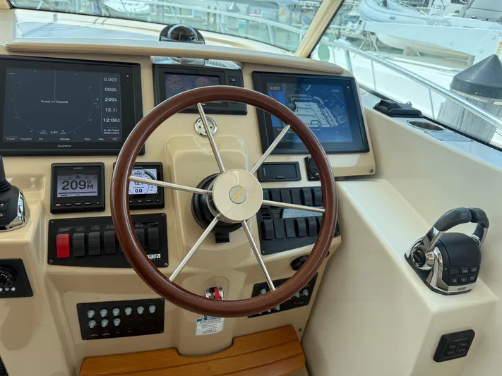  Yacht Photos Pics Helm of 2014 Tiara Yachts 4500 Sovran with advanced navigation controls and displays.