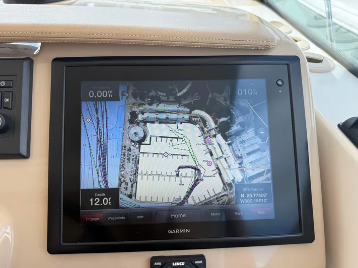  Yacht Photos Pics Garmin navigation display on 2014 Tiara Yachts 4500 Sovran, showing marina map and depth.