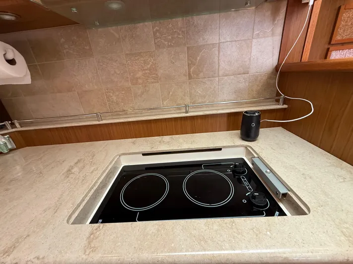  Yacht Photos Pics Modern kitchen in 2014 Tiara Yachts 4500 Sovran with electric stovetop.