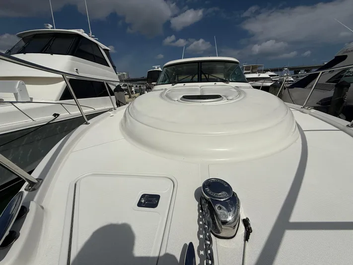  Yacht Photos Pics 2014 Tiara Yachts 4500 Sovran, white deck view, docked under blue sky.