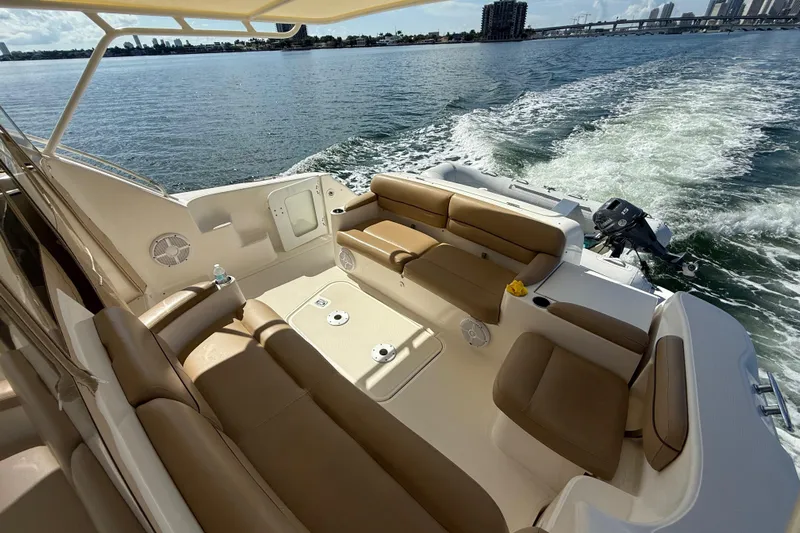  Yacht Photos Pics 2014 Tiara Yachts 4500 Sovran with spacious seating, cruising on open water.
