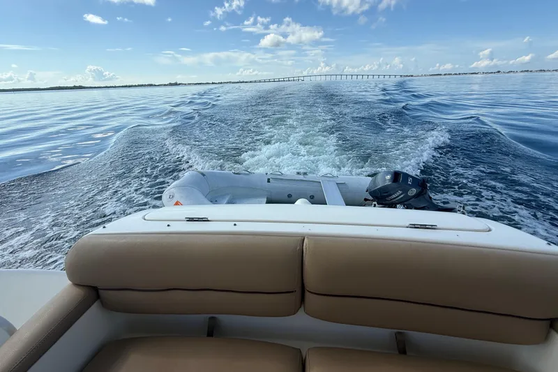  Yacht Photos Pics 2014 Tiara Yachts 4500 Sovran cruising on calm waters, view from the stern.
