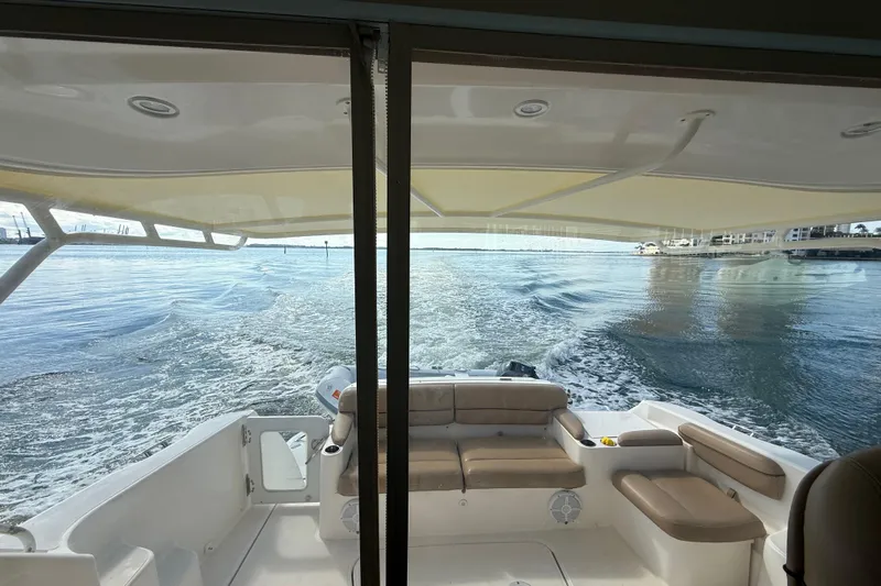  Yacht Photos Pics 2014 Tiara Yachts 4500 Sovran cruising, view from the deck with water wake.