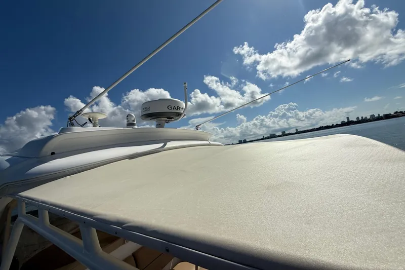  Yacht Photos Pics 2014 Tiara Yachts 4500 Sovran with Garmin radar, under a clear blue sky.
