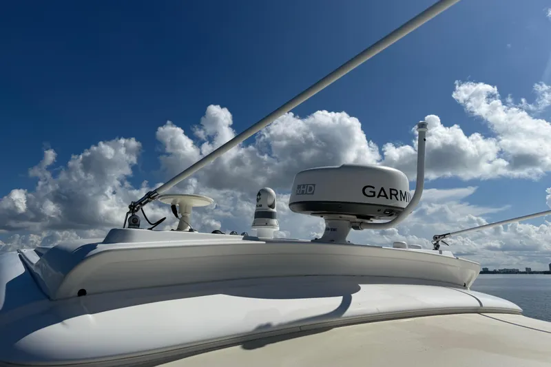  Yacht Photos Pics 2014 Tiara Yachts 4500 Sovran with Garmin radar under a clear blue sky.