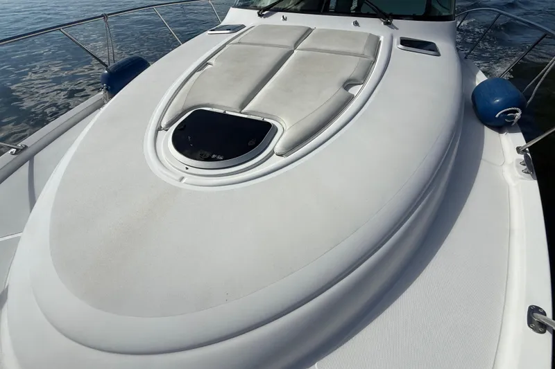  Yacht Photos Pics 2014 Tiara Yachts 4500 Sovran deck with cushioned seating and hatch.