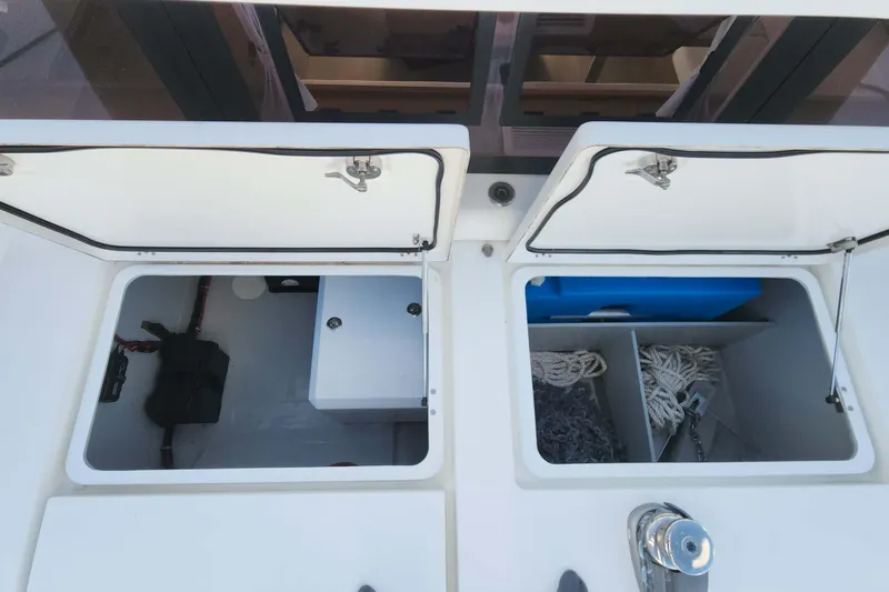  Yacht Photos Pics Storage compartments on a 2020 Lagoon 42 catamaran, featuring organized space and equipment.