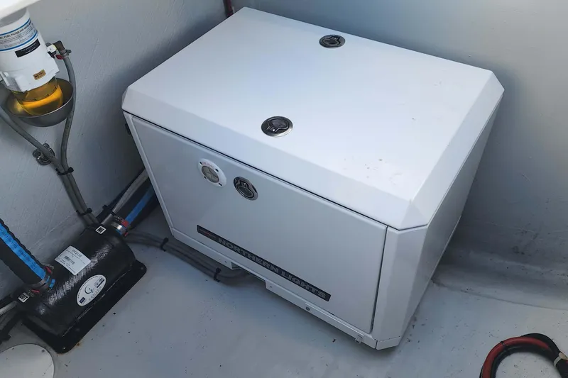 Yacht Photos Pics Engine compartment of a 2020 Lagoon 42 catamaran with generator and fuel filter.