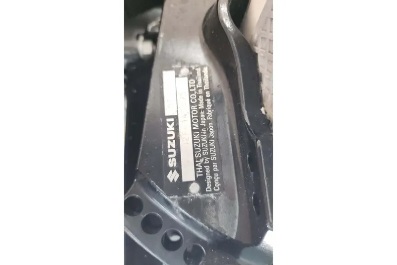  Yacht Photos Pics Label on Suzuki motor component, designed in Japan, made in Thailand.