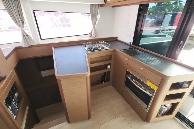  Yacht Photos Pics Modern kitchen in 2020 Lagoon 42 yacht with stove, oven, and sink.
