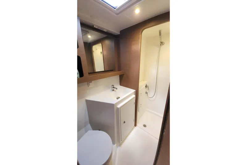  Yacht Photos Pics Modern bathroom in 2020 Lagoon 42 yacht with shower and sink.