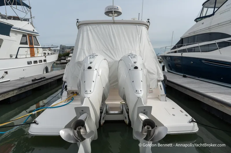 Qss Century Yacht Photos Pics 2024 Regal 36 XO yacht with twin outboard engines docked at marina.