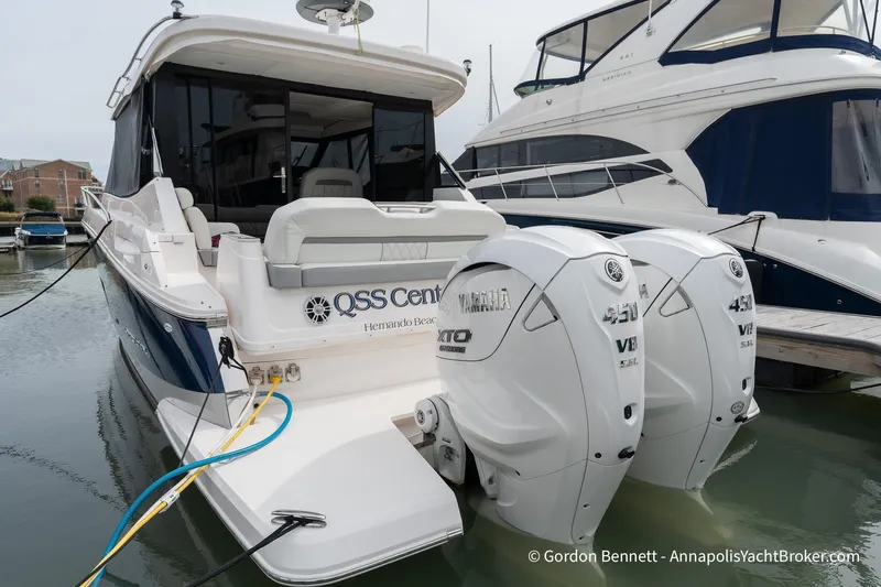 Qss Century Yacht Photos Pics 2024 Regal 36 XO yacht with twin Yamaha 450 engines docked at marina.
